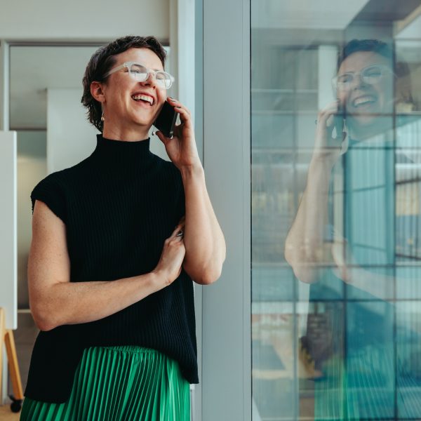 Woman talking on the phone discussing business advisory services